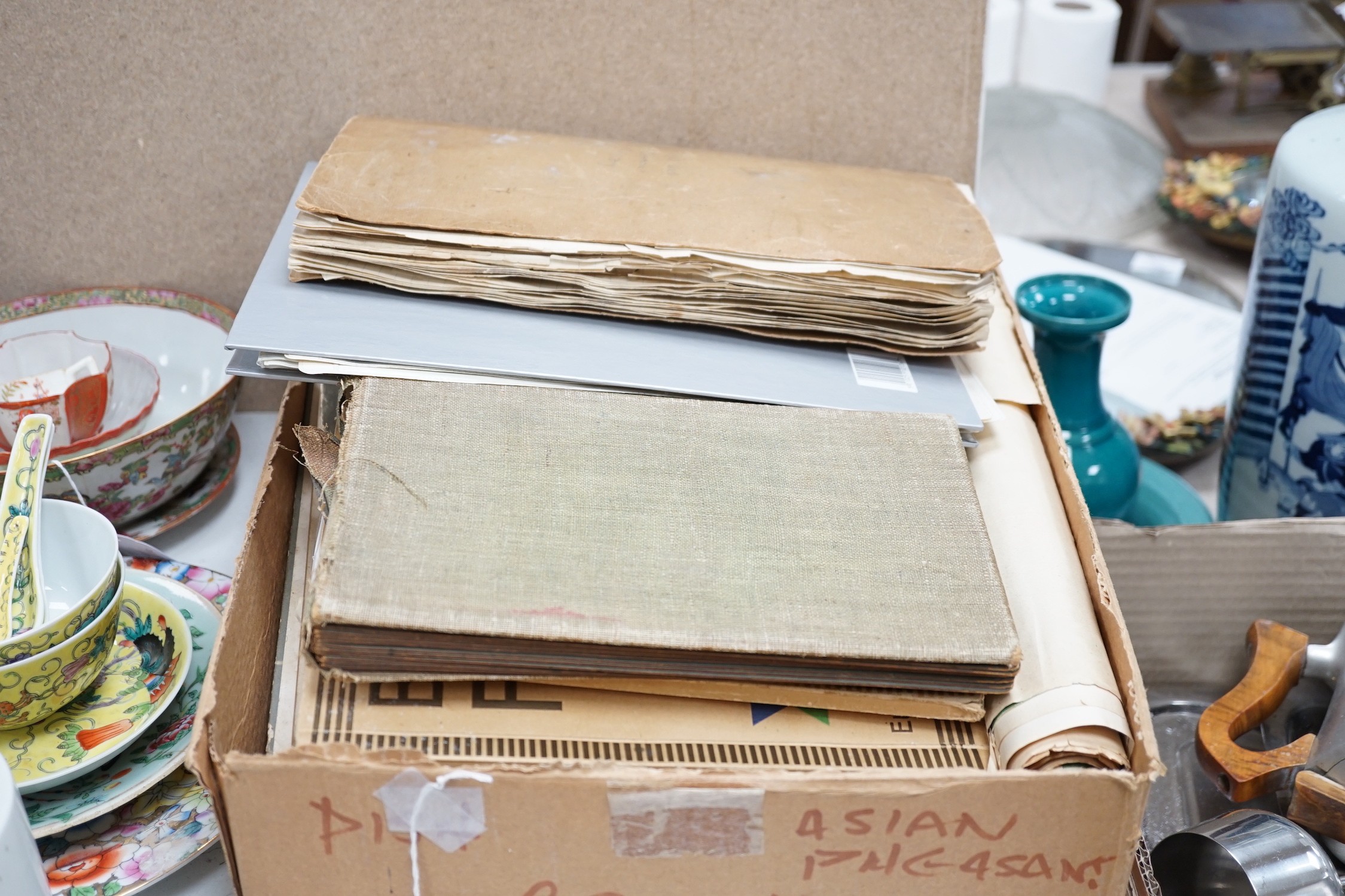 A collection of mixed ephemera, including 20th century comics, scrapbooks, newspapers, a photo album etc